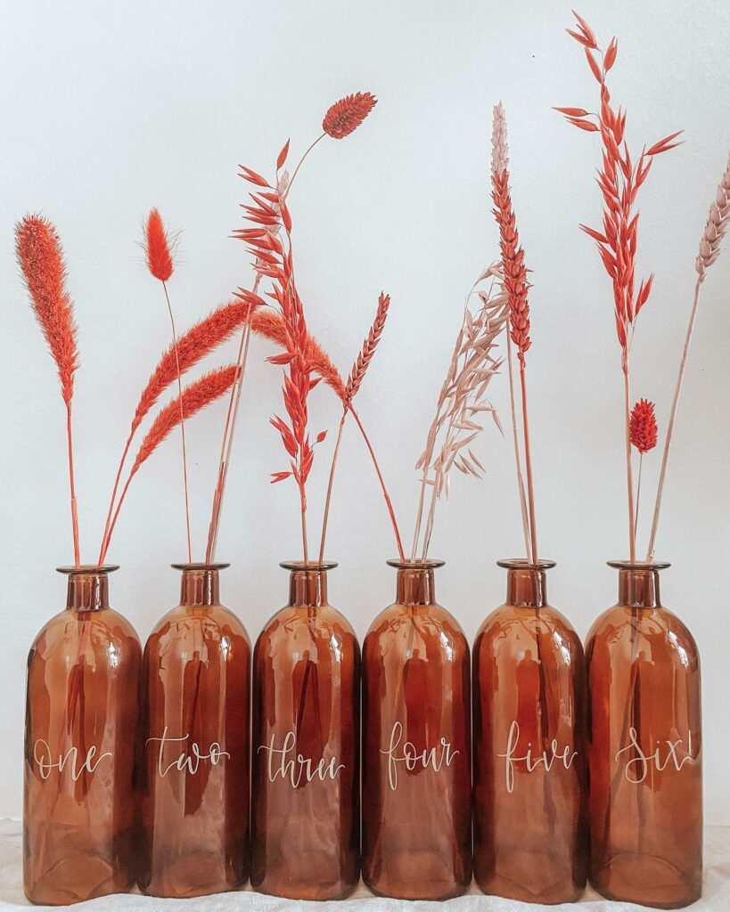 Calligraphy on glass bottles